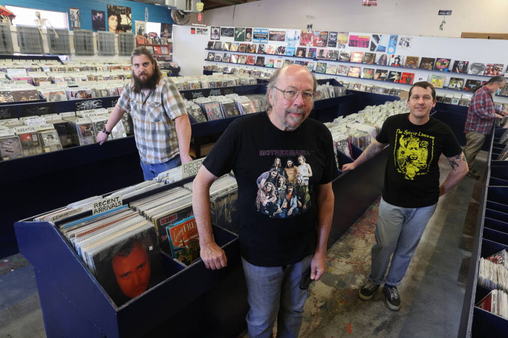 the co owners of the next record store are doug jayne center and his ...